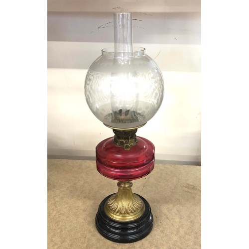 559 - Antique cranberry glass oil lamp