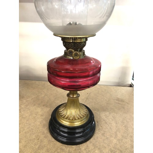 559 - Antique cranberry glass oil lamp