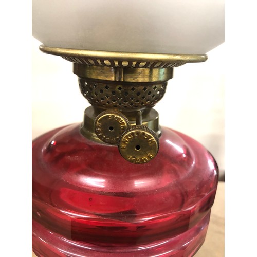 559 - Antique cranberry glass oil lamp