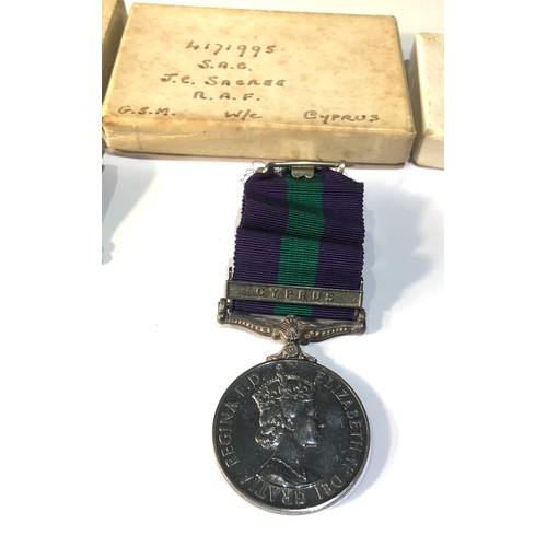 554 - Family boxed medals ww2 defence plus police exemplary to sgt charles e sacree also G.S.M cyprus  plu... 