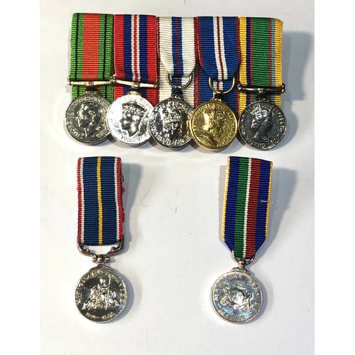 555 - Selection of miniature medals