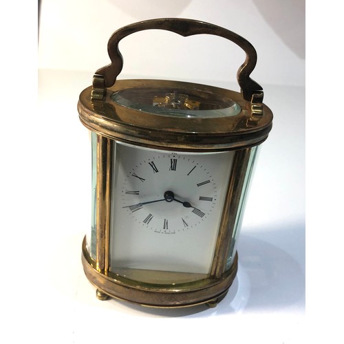 571 - Vintage heavy brass carriage clock in working order with key