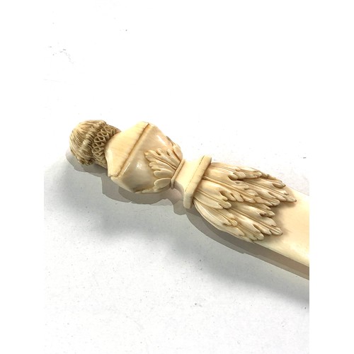 563 - Antique ivory figural top letter opener measures approx 27.5cm long