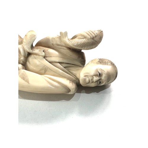 564 - Antique 19th century signed ivory figure of a fisherman clean break to leg as shown measures approx ... 