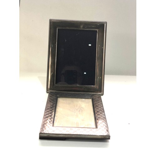 57 - 2 vintage silver picture frames largest measures approx 22cm by 17cm