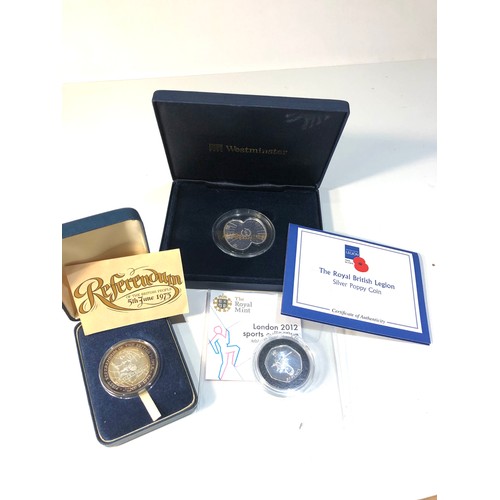 579 - 3 silver proof coins includes referendum 1975 poppy coin and the london 2012 sports