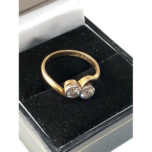 103 - Fine 18ct gold and diamond ring set with 2 diamonds est approx 0.90ct  weight of ring 3.2g