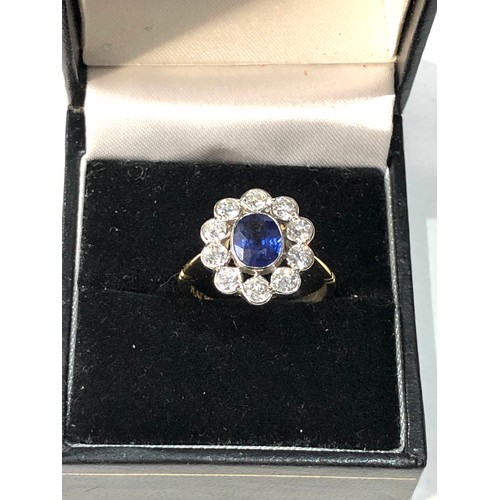 109 - Fine Platinum & 18ct gold  Sapphire & diamond halo ring set with central sapphire measures approx 7m... 