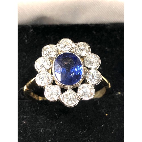 109 - Fine Platinum & 18ct gold  Sapphire & diamond halo ring set with central sapphire measures approx 7m... 