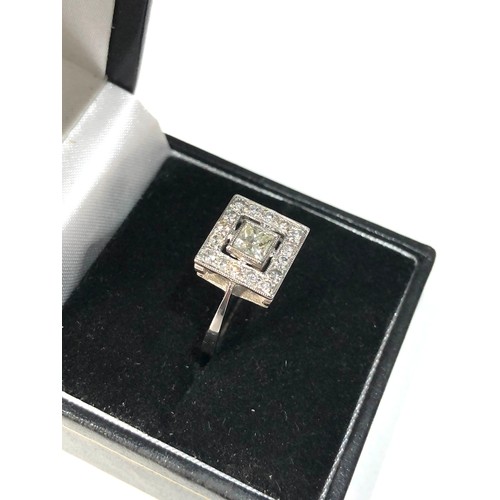 110 - Platinum and diamond ring central diamond measures approx 4mm by 4mm with diamond halo weight of rin... 