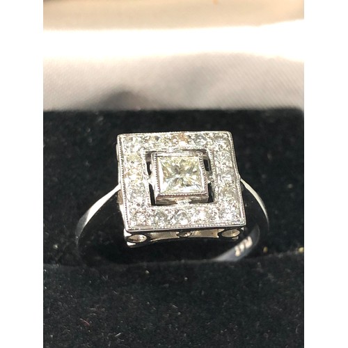 110 - Platinum and diamond ring central diamond measures approx 4mm by 4mm with diamond halo weight of rin... 