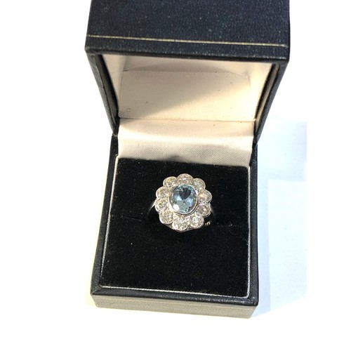 111 - Fine Platinum Aquamarine  and diamond halo ring set with central aquamarine 1.5ct 11mm by 7mm with a... 