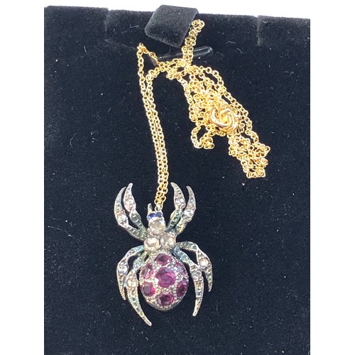 116 - Rose diamond and ruby spider pendant and chain gold back silver front with 18ct gold chain body set ... 