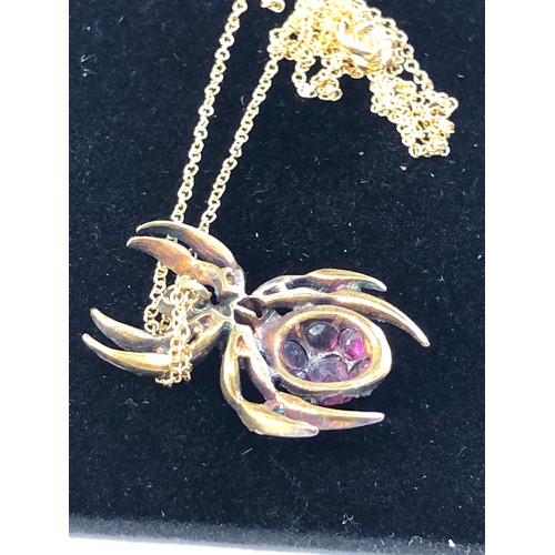 116 - Rose diamond and ruby spider pendant and chain gold back silver front with 18ct gold chain body set ... 