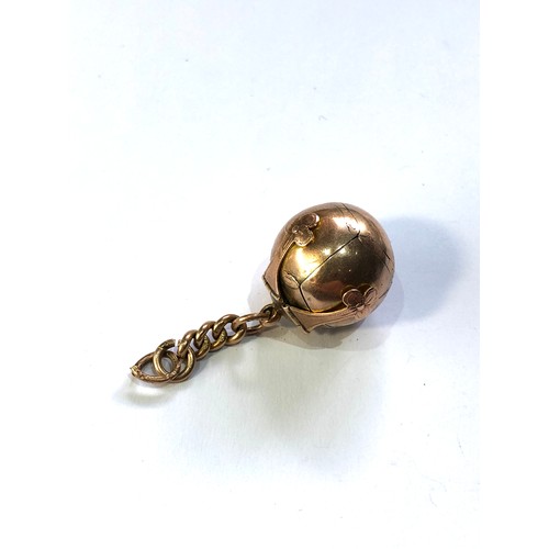 119 - large antique gold masonic ball pendant with small part of gold chain ball measures 2.2m by 2.4cm dr... 