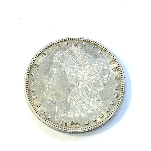 577 - Silver 1884 American one dollar