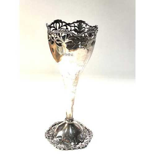 28 - Ornate antique silver rose vase measures approx 18cm tall pierced base and rim not filled weight 120... 