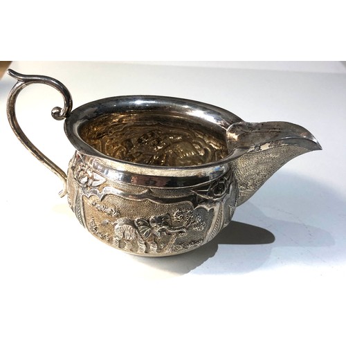 31 - Embossed Indian / asian silver milk jug weight 174g