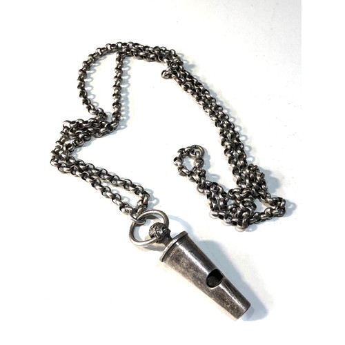 525 - Antique military whistle & chain from a shoulder belt