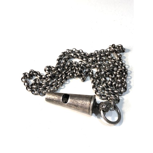 525 - Antique military whistle & chain from a shoulder belt