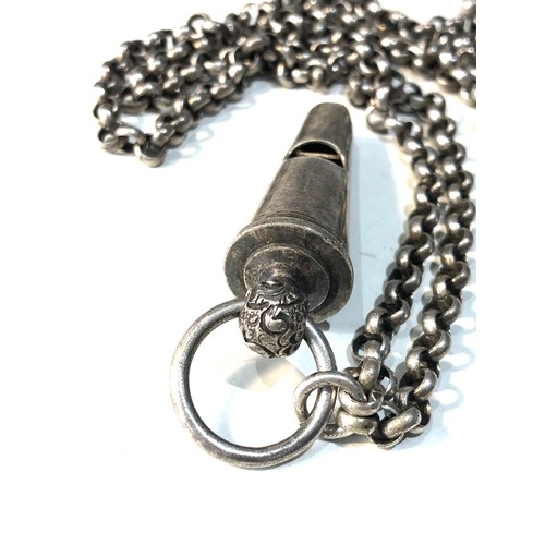 525 - Antique military whistle & chain from a shoulder belt