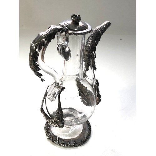 49 - Antique silver mounted oil bottle measures approx 15cm tall mounts have wire attachemets as shown  p... 