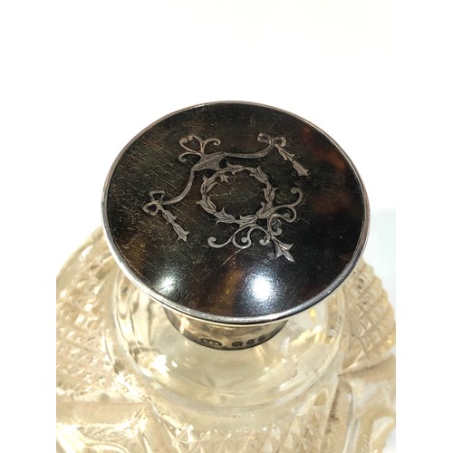 50 - Antique Tortoiseshell and inlaid silver top scent bottle  London silver hallmarks measures approx 11... 