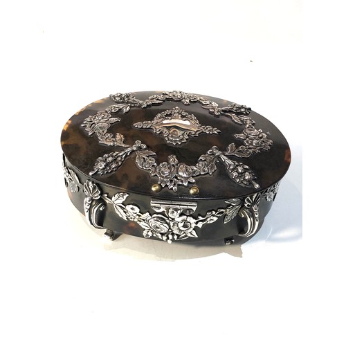 52 - Large Antique Tortoiseshell and silver jewellery box  measures approx 15cm by 12cm and 7cm tall in g... 