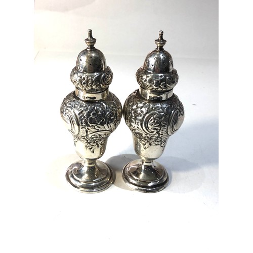 58 - 2 Antique silver peppers measures approx  height 13cm Birmingham silver hallmarks weight 120g please... 