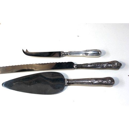 59 - Vintage silver handled bread knife , cake slice and cheese knife te cake slice handle is not hallmar... 