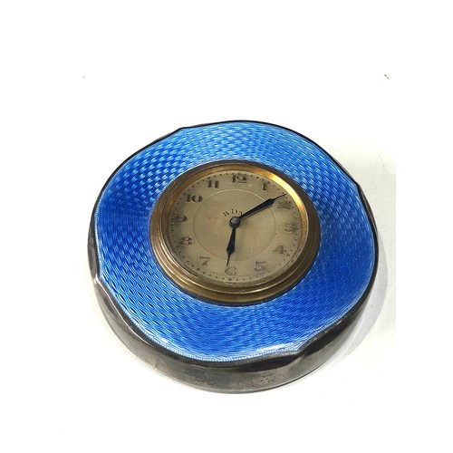 552 - Antique 8 day silver and enamel clock blue enamel in good condition hallmarks worn to edge measures ... 