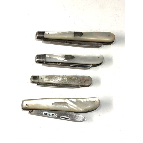 83 - 4 antique pen knives .please see images for detail as they are part of the description mop handles a... 