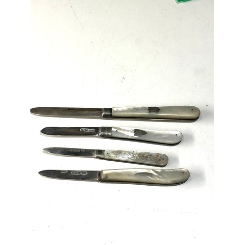 83 - 4 antique pen knives .please see images for detail as they are part of the description mop handles a... 