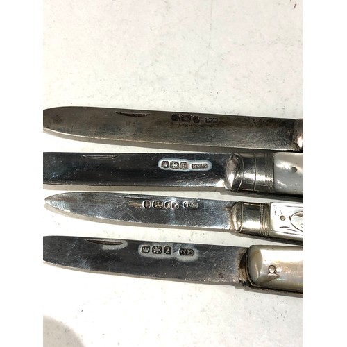 83 - 4 antique pen knives .please see images for detail as they are part of the description mop handles a... 