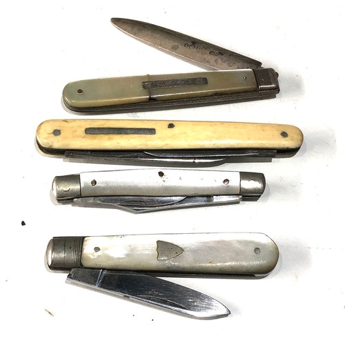 573 - 4 antique pen knives .please see images for detail as they are part of the description mop handles a... 