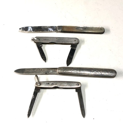 574 - 4 antique pen knives .please see images for detail as they are part of the description silver handle... 