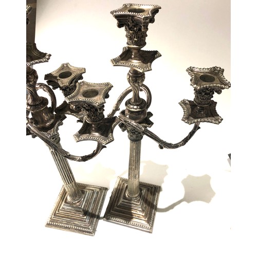 100 - Large pair of antique silver plated candleabra each measures approx height 24ins by 13ins wide age r... 