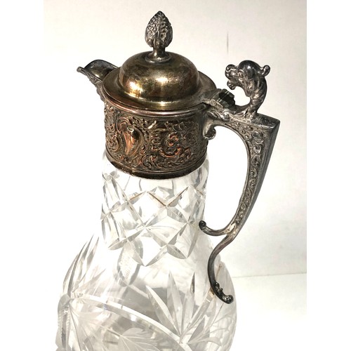 101 - Large pair of cut glass and silver pated claret jugs in good antique condition each measures approx ... 