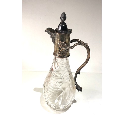 102 - Large p cut glass and silver pated claret jug in good antique condition measures approx 13ins tall  ... 