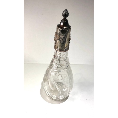 102 - Large p cut glass and silver pated claret jug in good antique condition measures approx 13ins tall  ... 