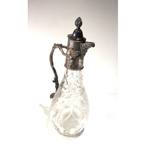 102 - Large p cut glass and silver pated claret jug in good antique condition measures approx 13ins tall  ... 