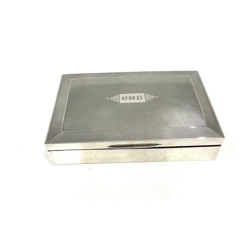 89 - Hallmarked silver cigarette box, wood inlay, engraved initials, overall good age related condition, ... 