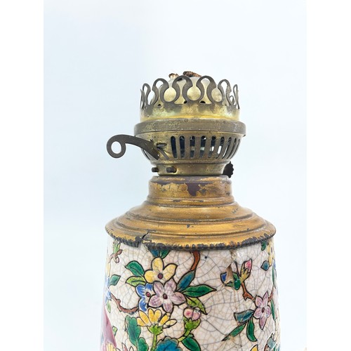 576 - Early ceramic oil lamp, some damage please view images