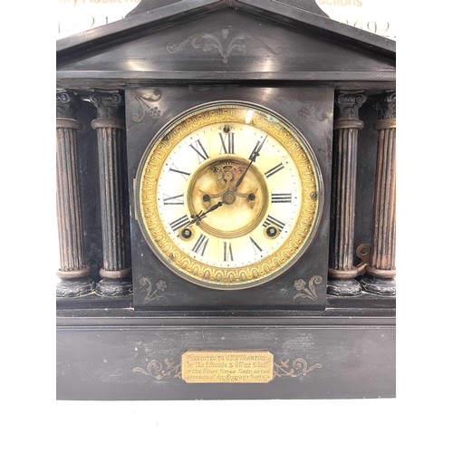 556 - Antique slate mantle clock, with presentation plaque dated 1909, good overall age related condition ... 