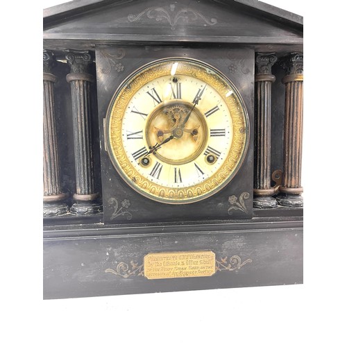 556 - Antique slate mantle clock, with presentation plaque dated 1909, good overall age related condition ... 