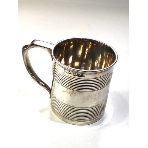 87 - Georgian silver mug measures approx 6.8cm high London silver hallmarks later engraved initials weigh... 