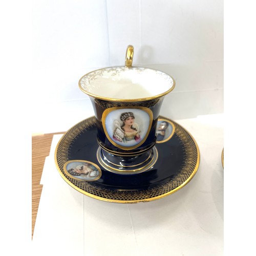 72 - Pair Limoges cup and saucers, one saucer has sustained a chip