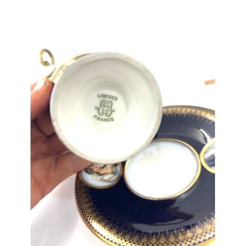 72 - Pair Limoges cup and saucers, one saucer has sustained a chip