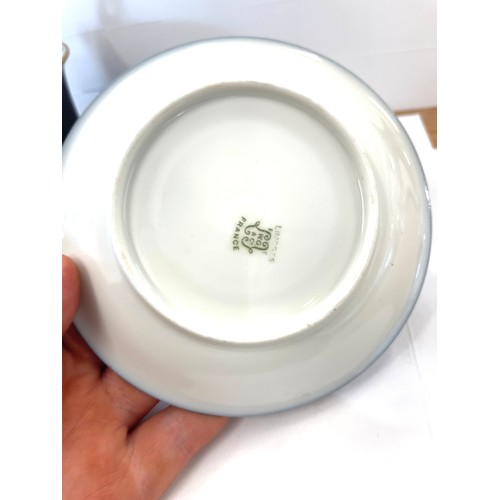 72 - Pair Limoges cup and saucers, one saucer has sustained a chip