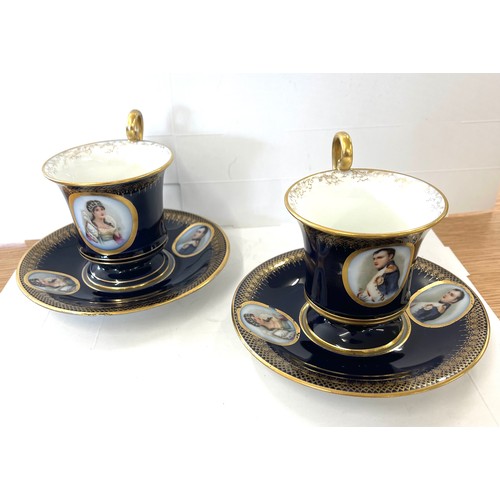 72 - Pair Limoges cup and saucers, one saucer has sustained a chip